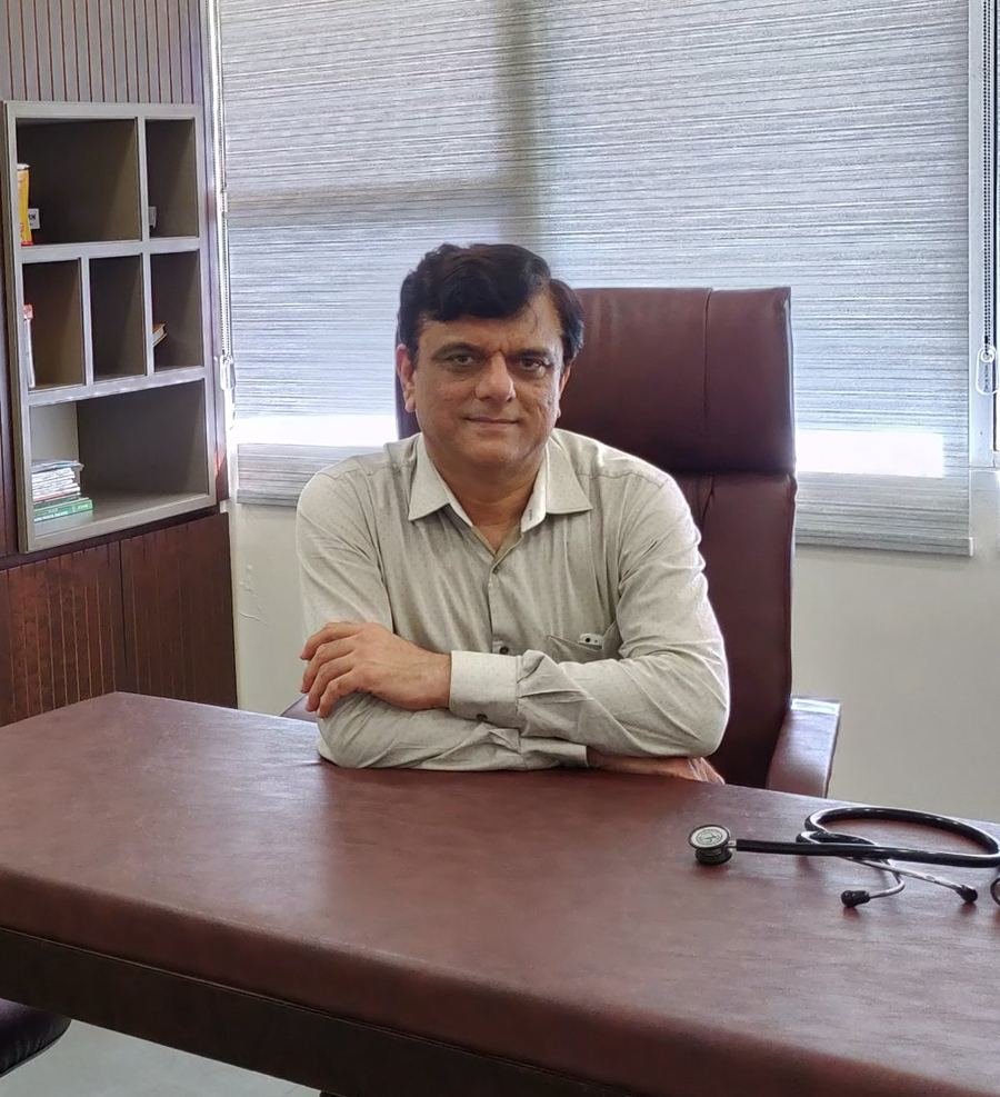 Dr. Harish Kodnani, pediatrician, at his desk in Anuj Children Hospital